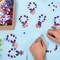 1024Pcs 4th of July Crafts Independence Day Craft Kit Patriotic Beads and American Flag Charms for Jewelry Making Red White Blue Pony Beads Star Beads and Wooden Pendant for DIY Bracelet Making Supply